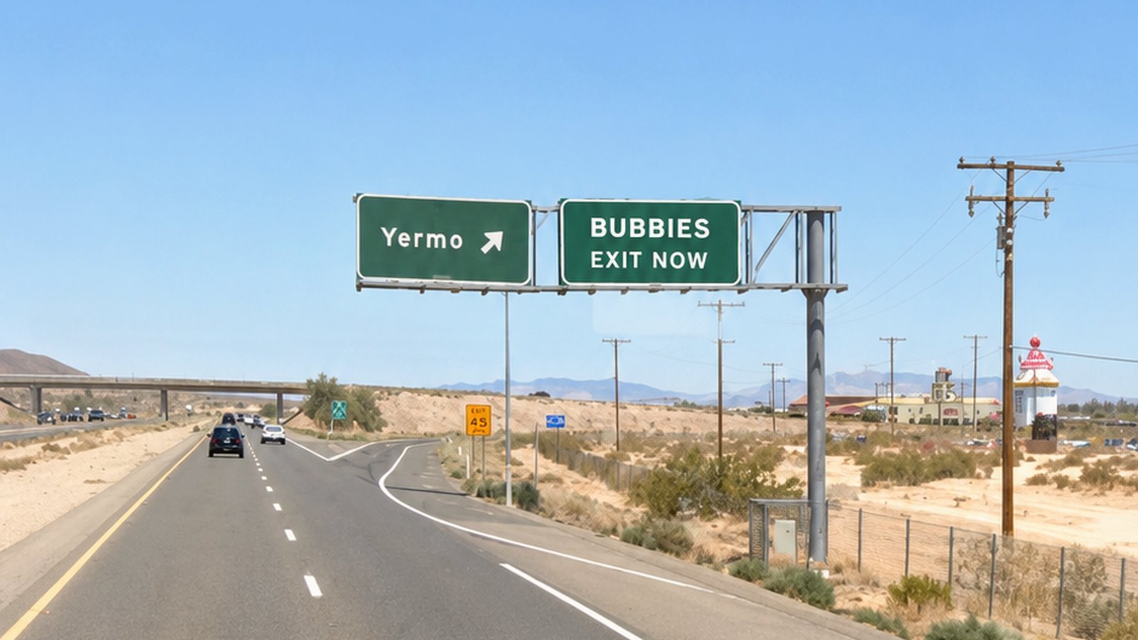 Road view of the Yermo and Bubbies exit signs